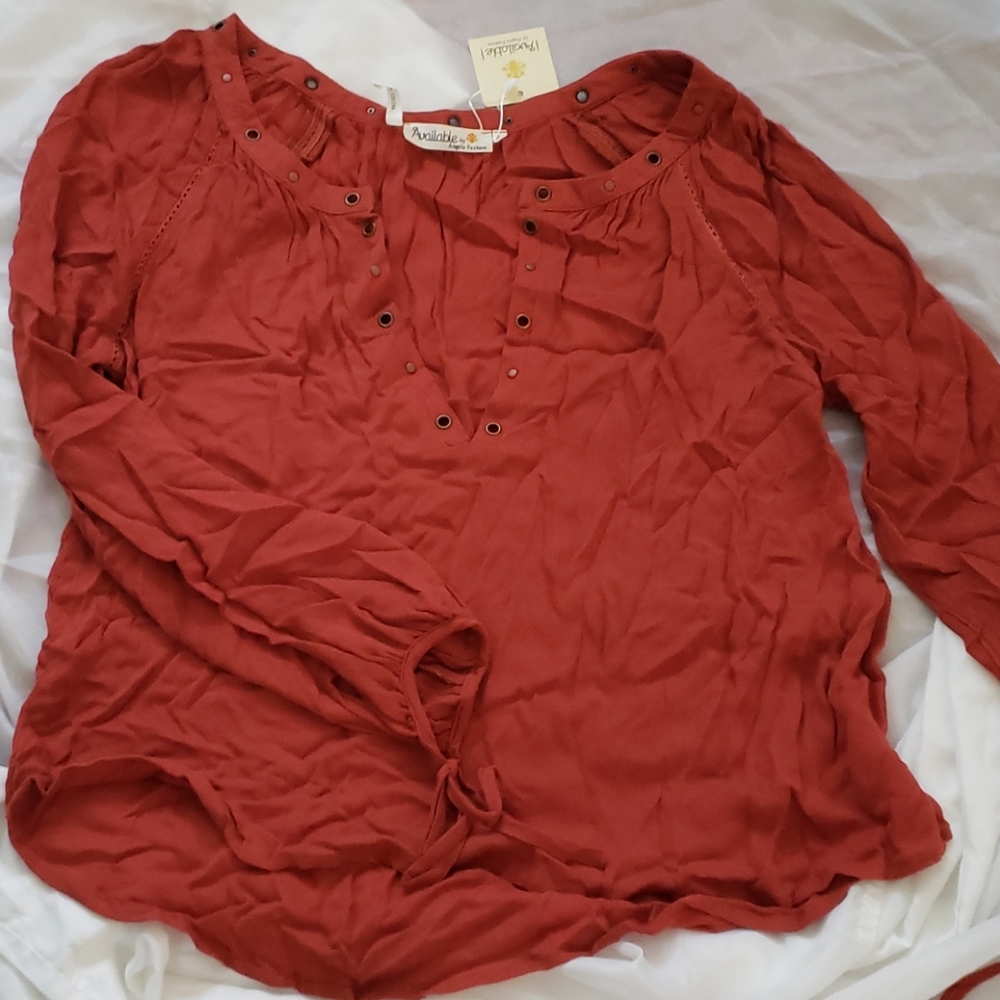 Rust colored top with hook and eye closure